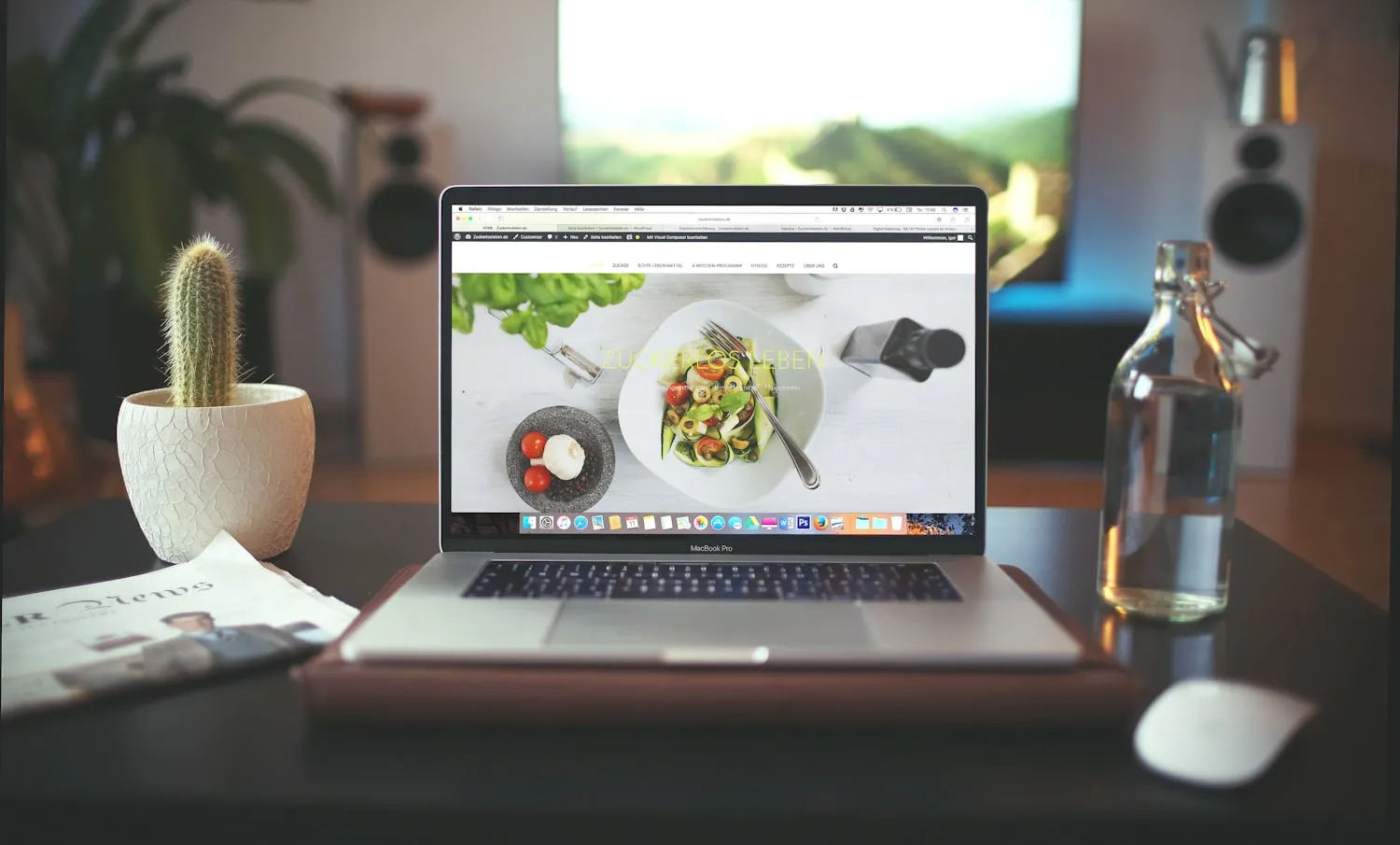 A designed website open in a browser on a laptop